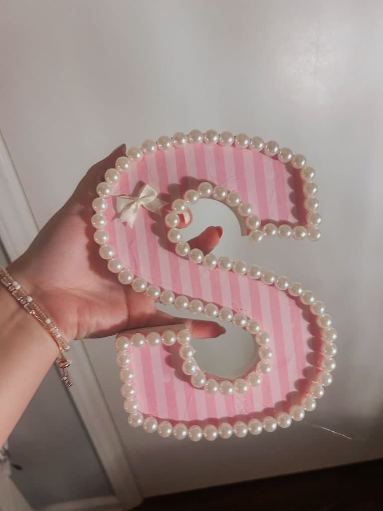 Pink stripe letter S with bow and pearls
