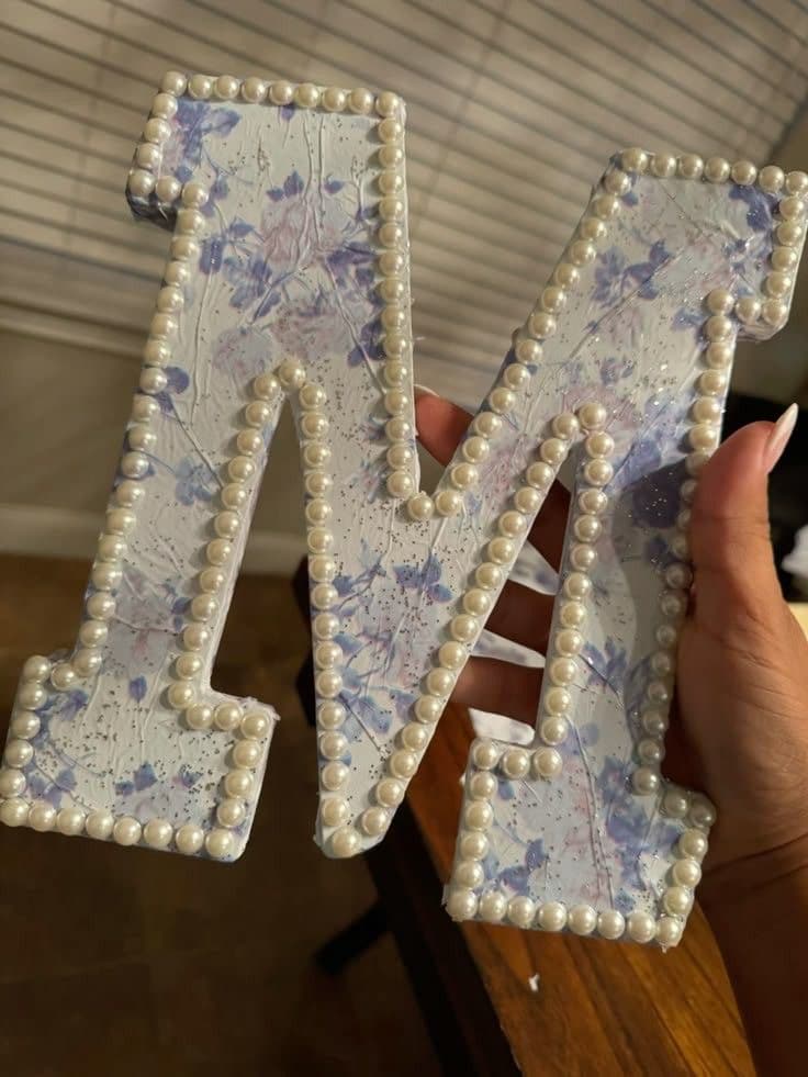 Floral pearl-trim letter M