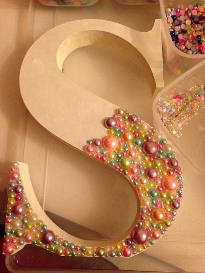 Pearl beaded letter S in pastel gems